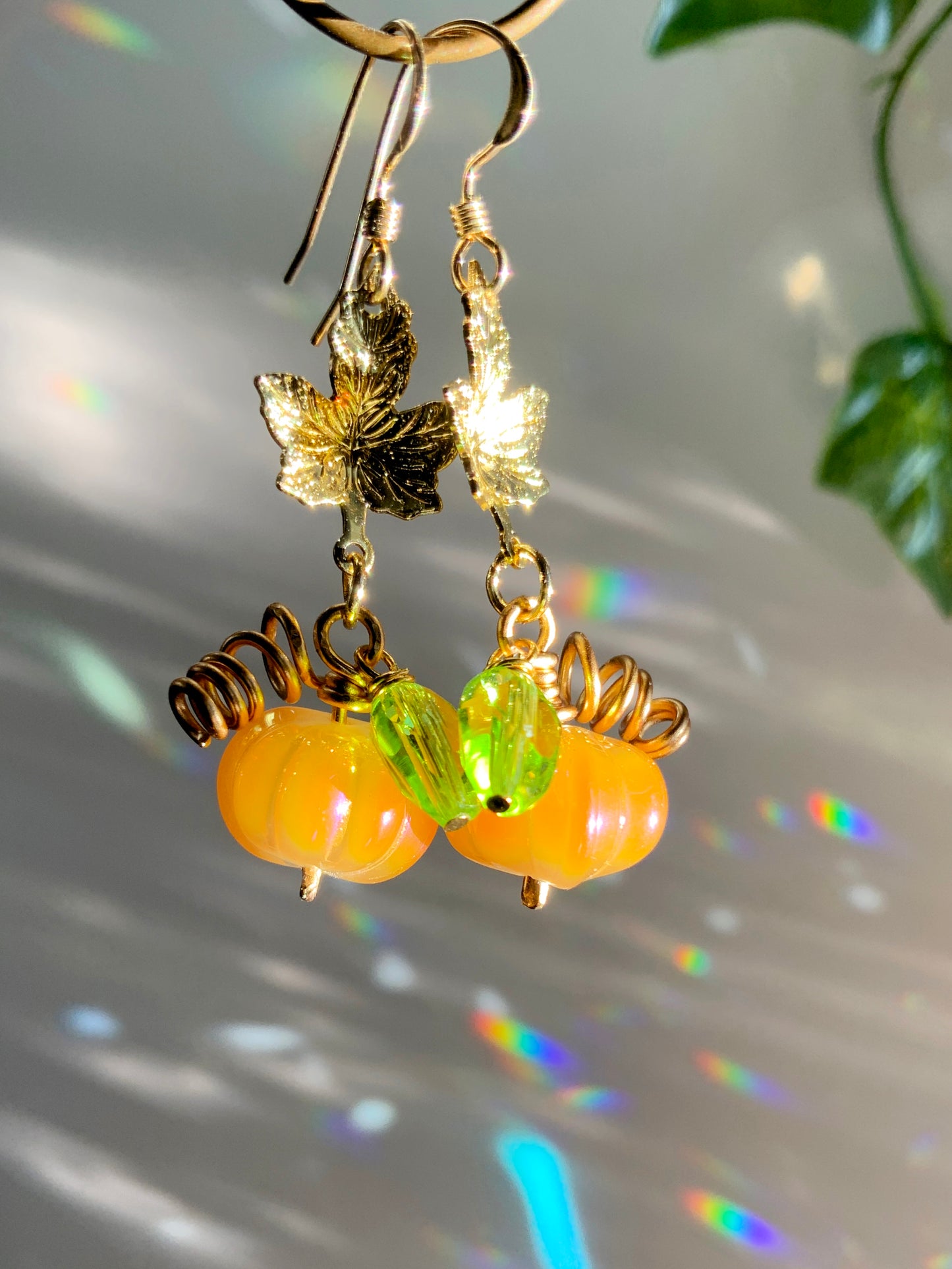 Mystic Pumpkin earrings ~ Orange Aura Glass with pink and blue reflections, 18k Gold-Plated Maple