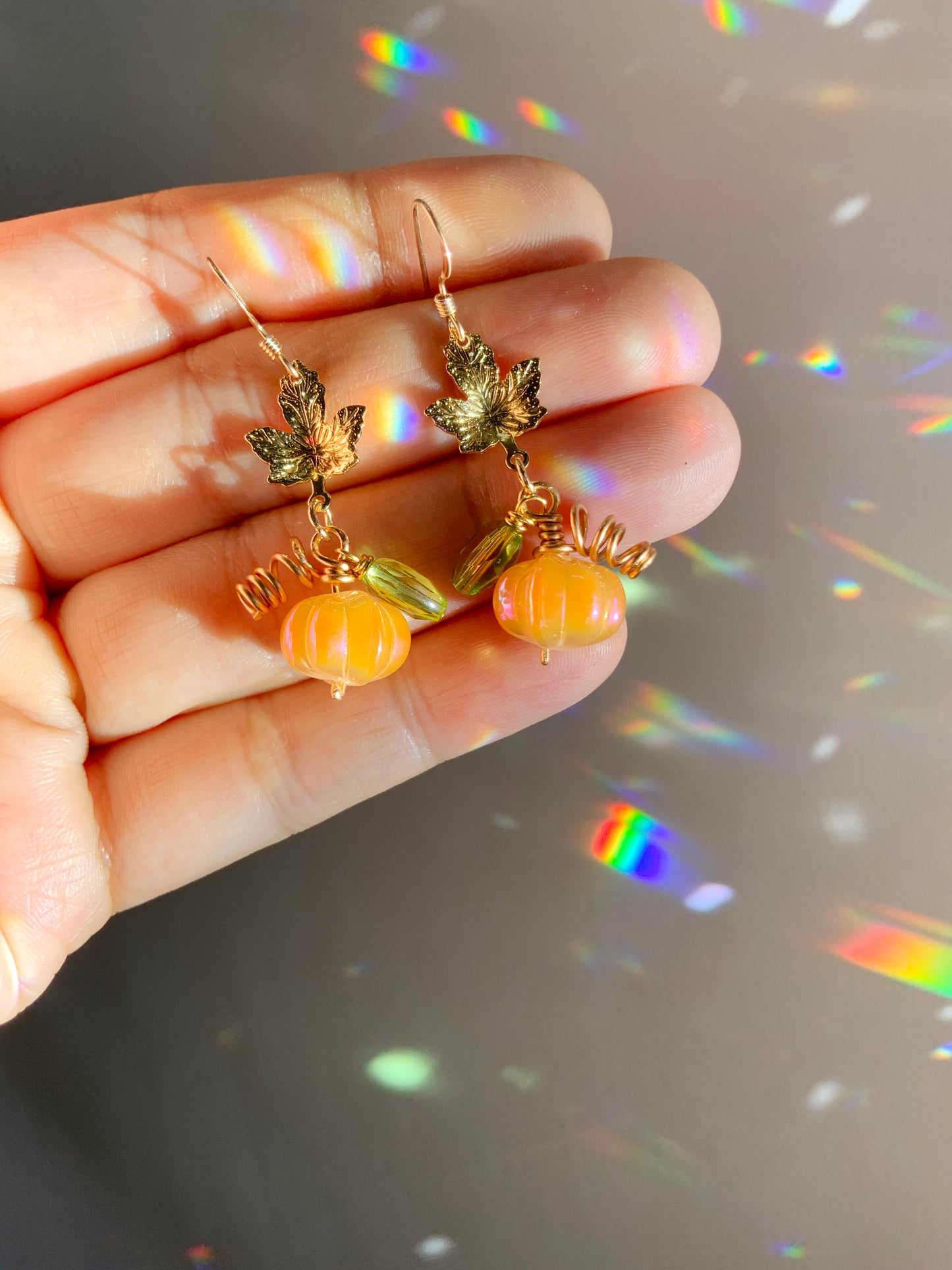 Mystic Pumpkin earrings ~ Orange Aura Glass with pink and blue reflections, 18k Gold-Plated Maple