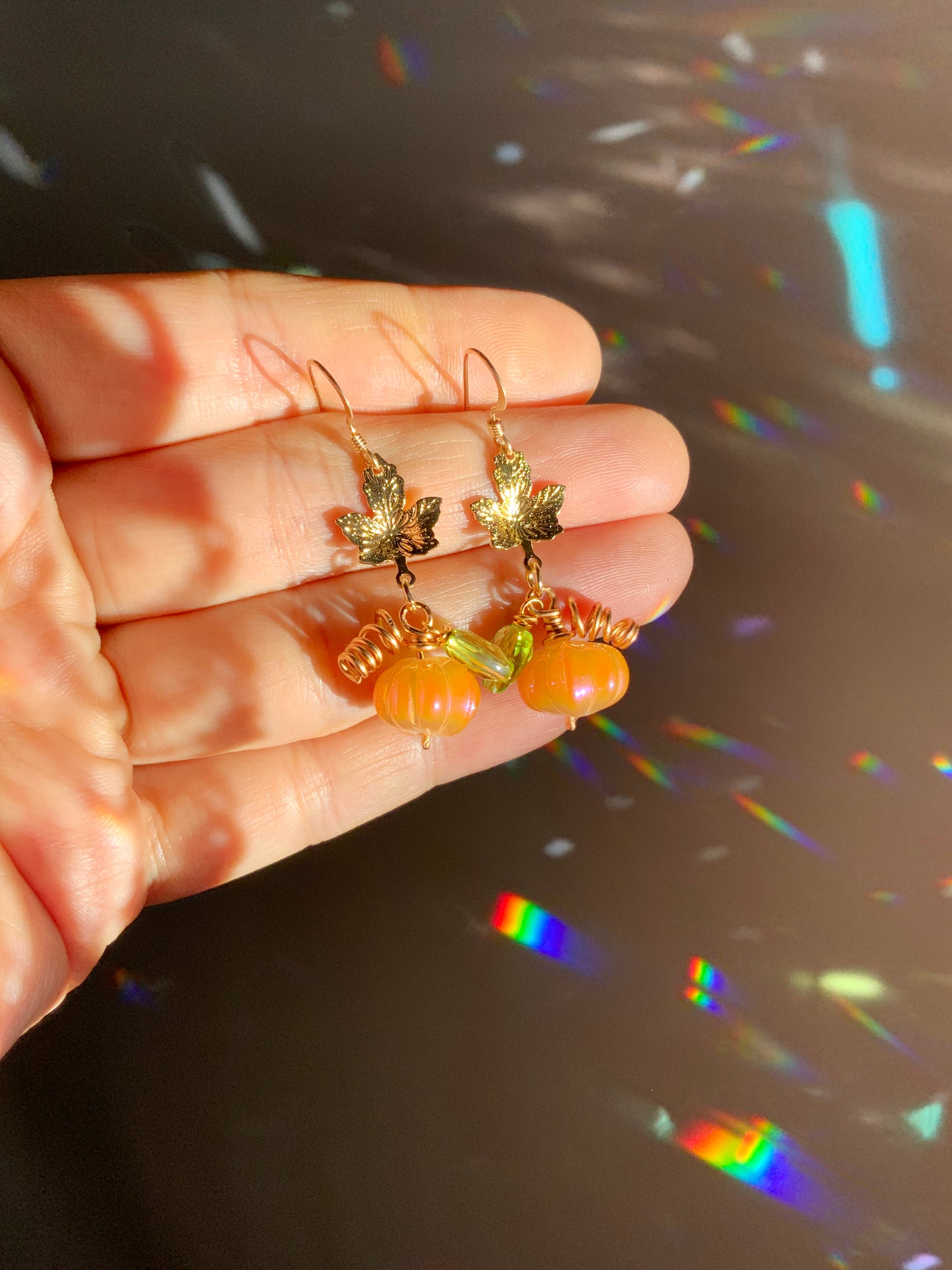 Mystic Pumpkin earrings ~ Orange Aura Glass with pink and blue reflections, 18k Gold-Plated Maple