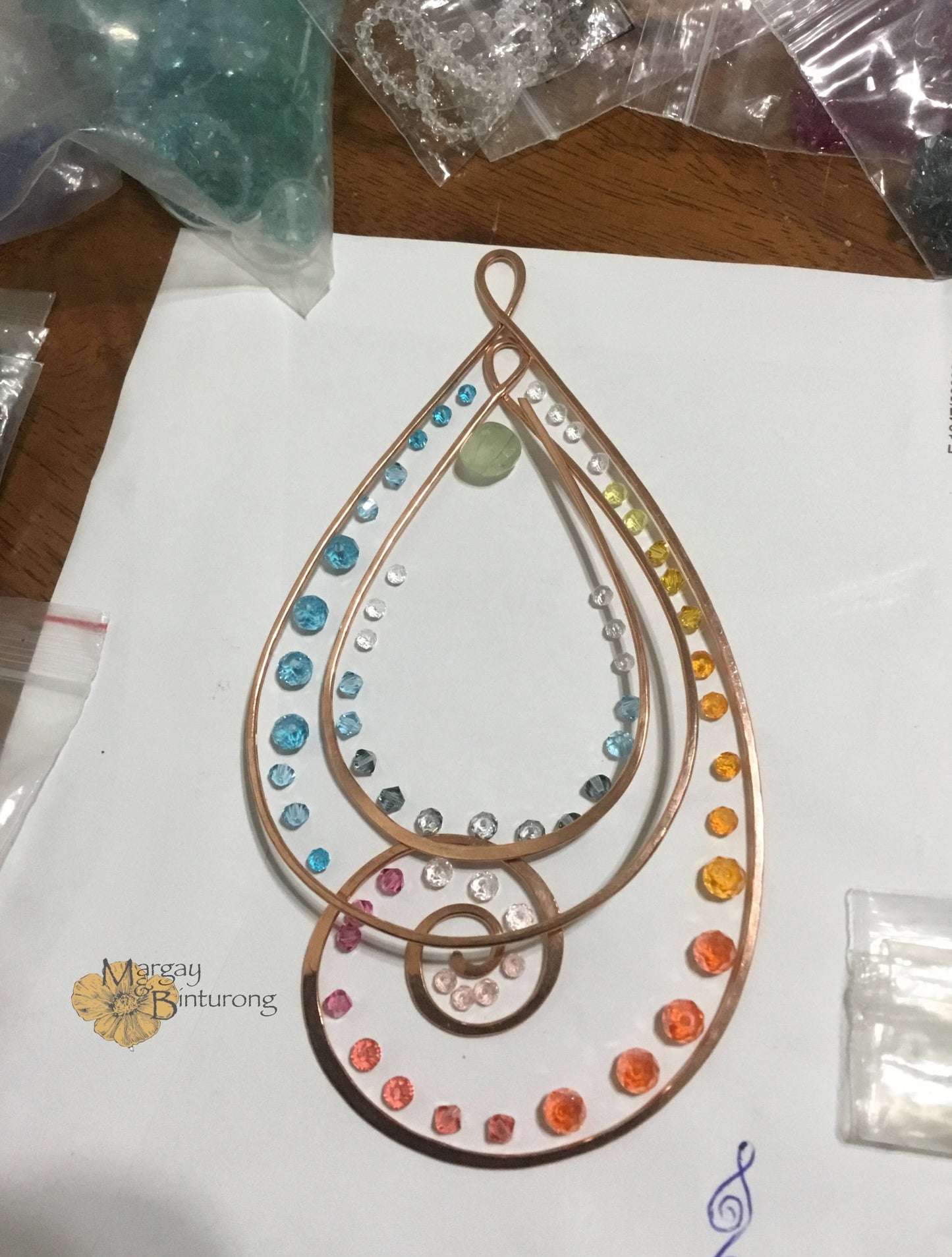 Paisley-esque Suncatcher made with Crystal prisms is wire art waiting to be hung in your home
